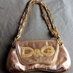 Dolce & Gabbana rose gold clutch